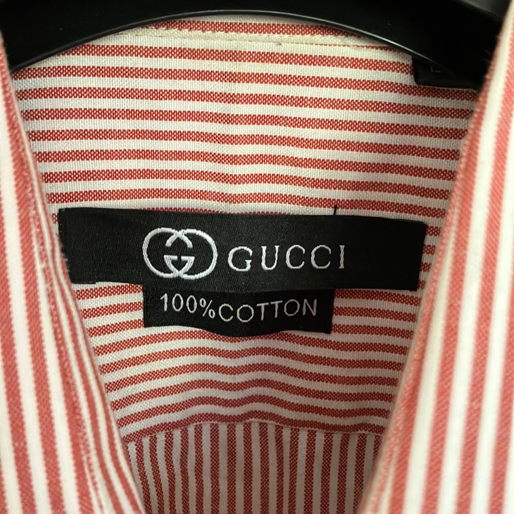 Gucci 100percent cotton men’s shirt in gorgeous coral red stripe. Like new!